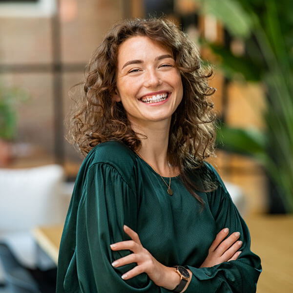lady in green shirt smiling